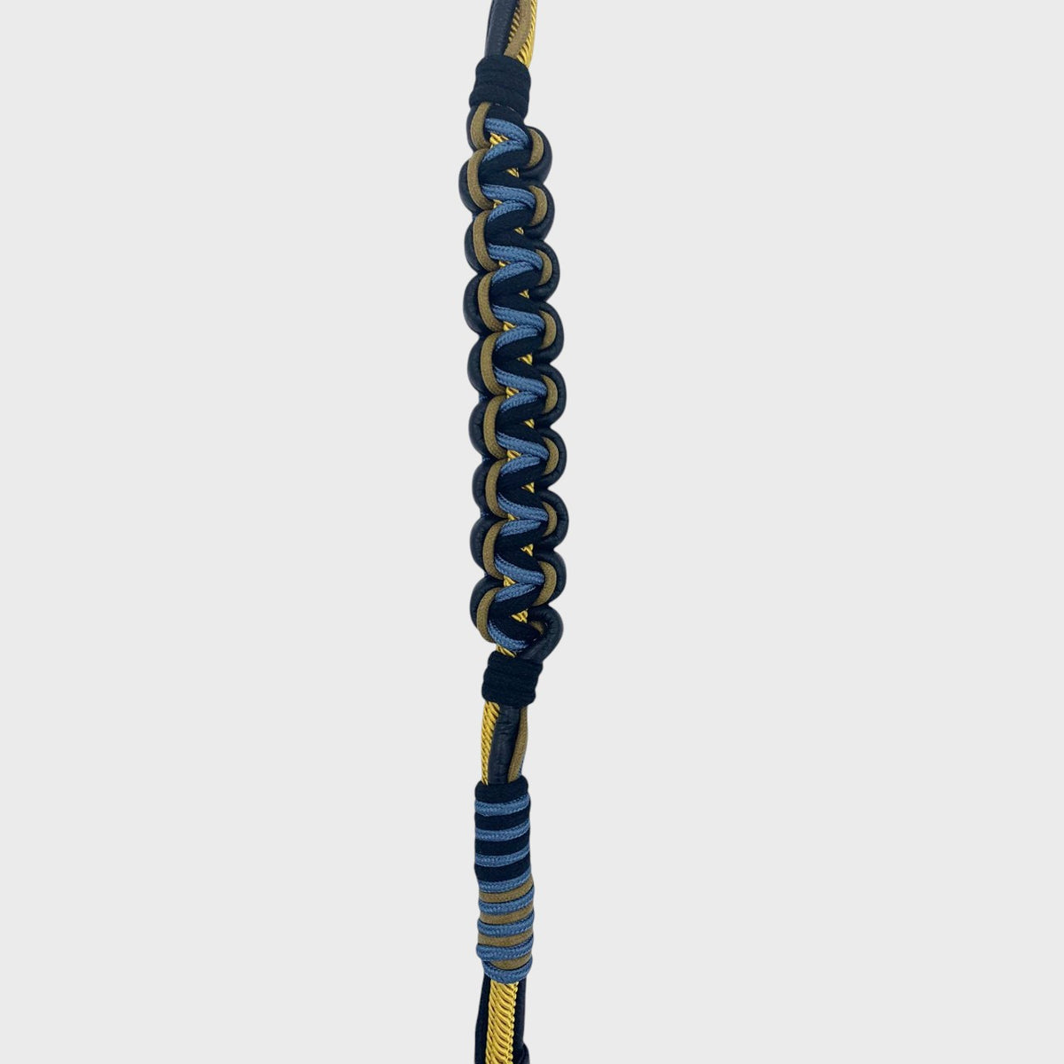The detail of the macramé braided bag strap.