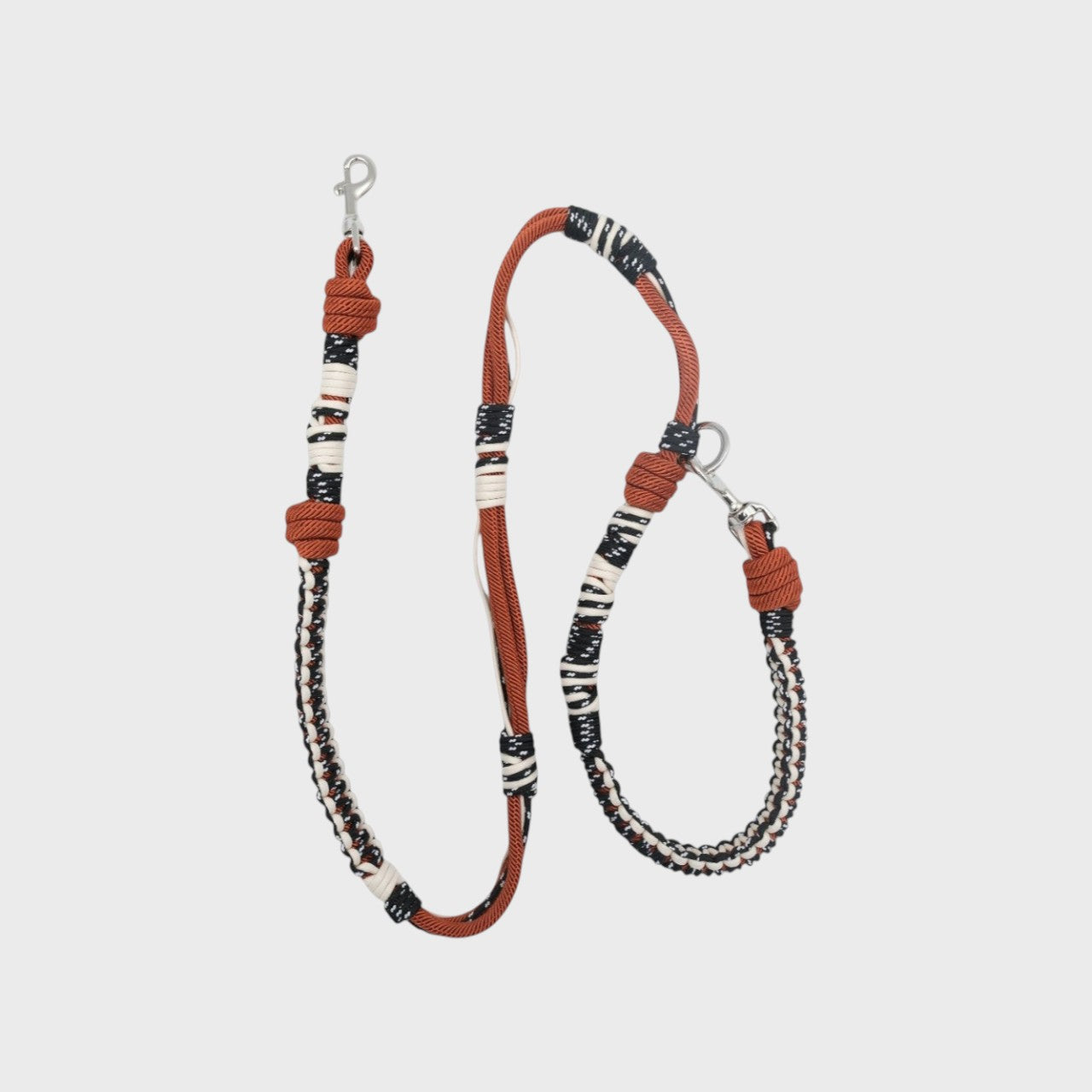 Black, white and dark red Tarzan Dog leash presented horizontally
