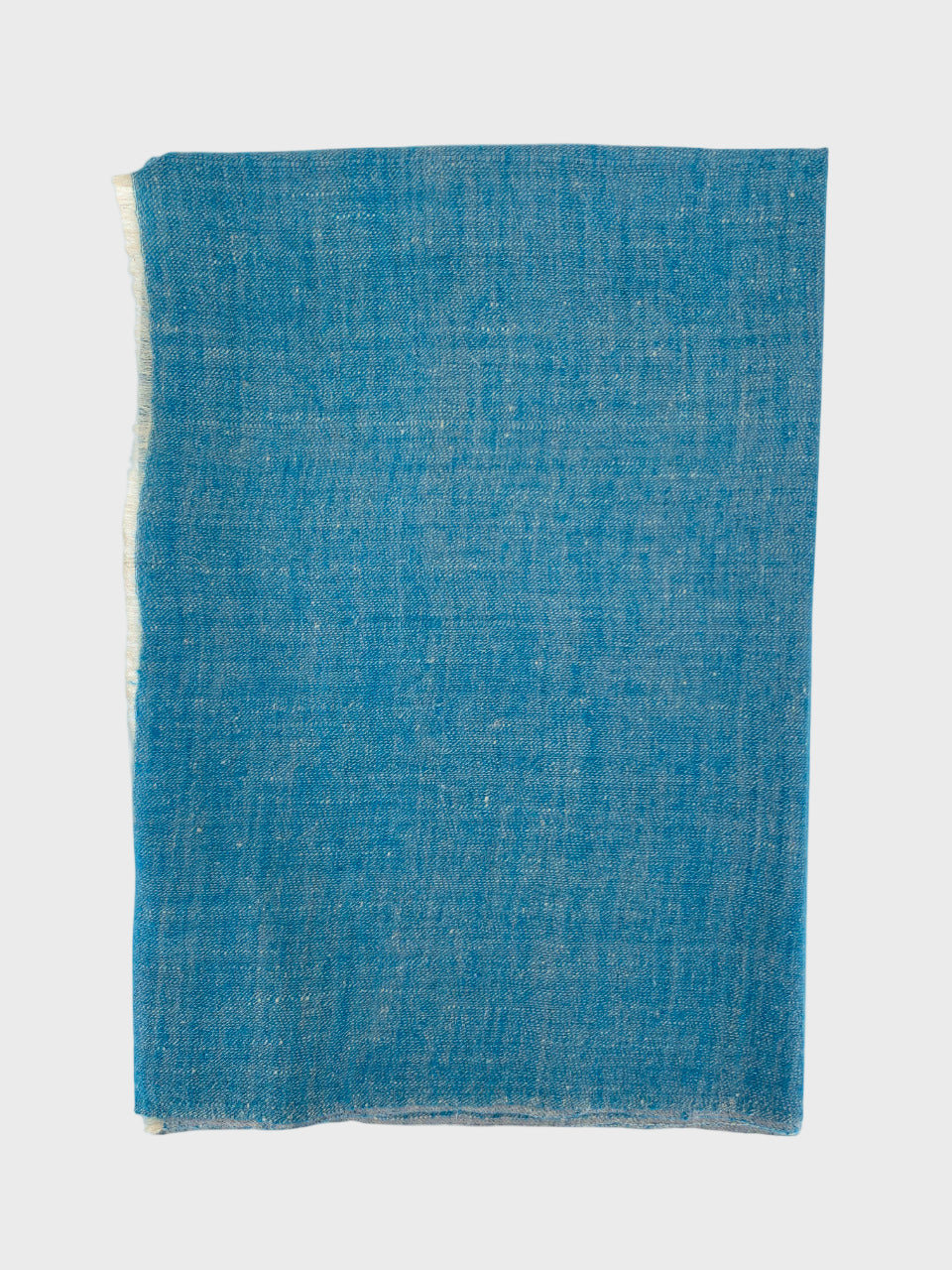 Blue cashmere shawl on a white background