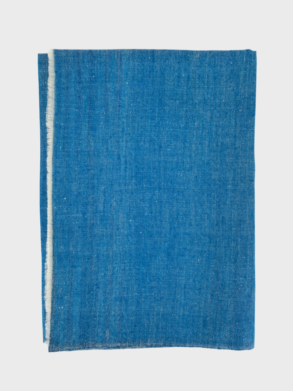 Blue cashmere shawl or scarf on a white background