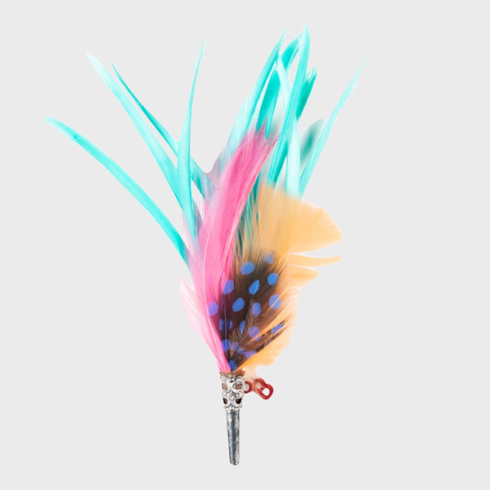 Pink, bright light blue and orange feathered brooch on a light gray background