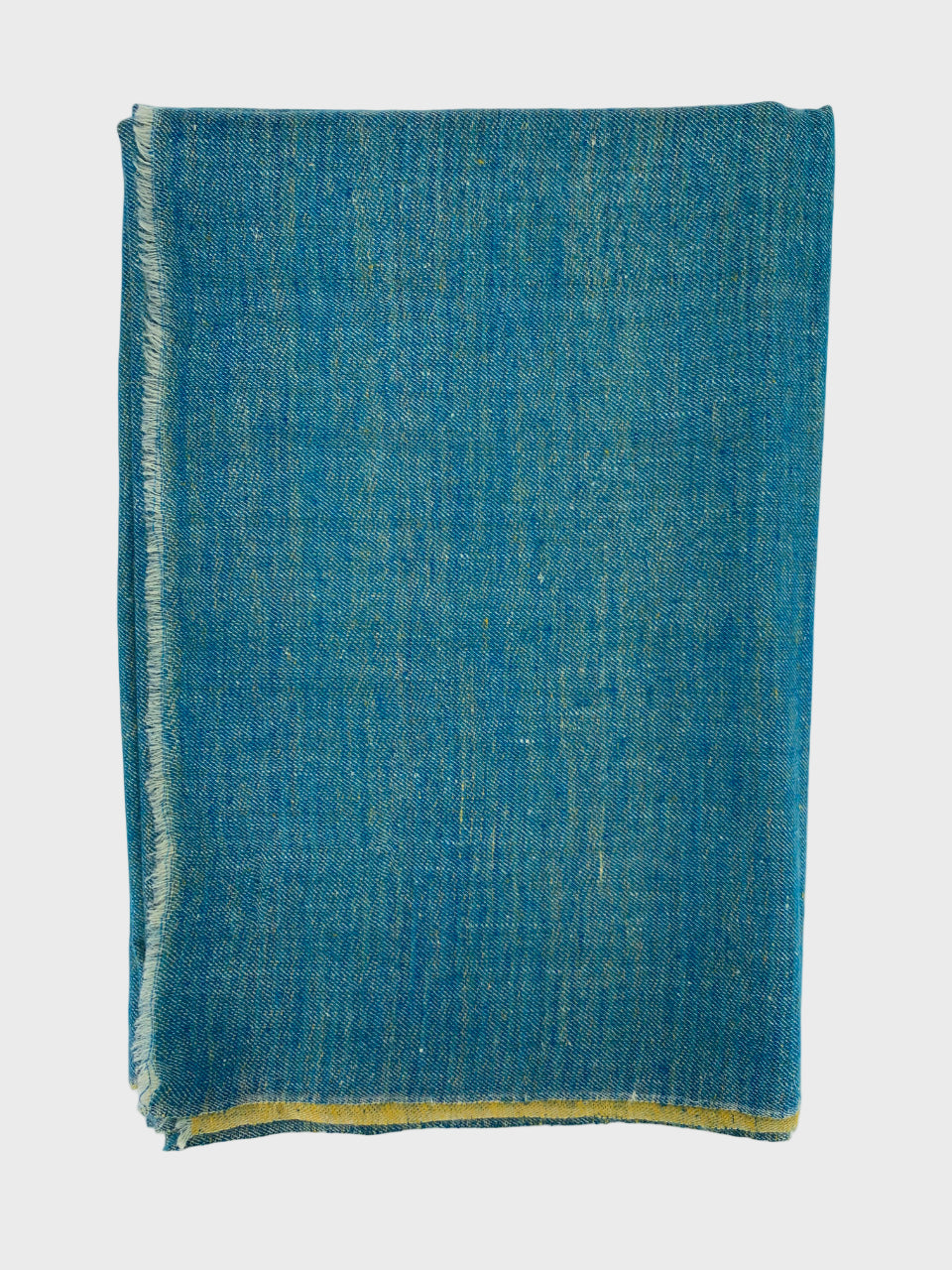 Blue cashmere shawl on a white background