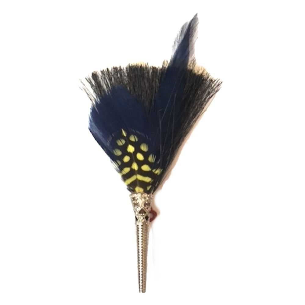 A feather brooch with blue, black and yellow feathers.
