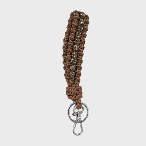 A macramé braided keychain strap featuring a brown and dark green pattern, accented with a vertical row of brown rhinestones, and finished with a silver metal lobster clasp on a light gray background.