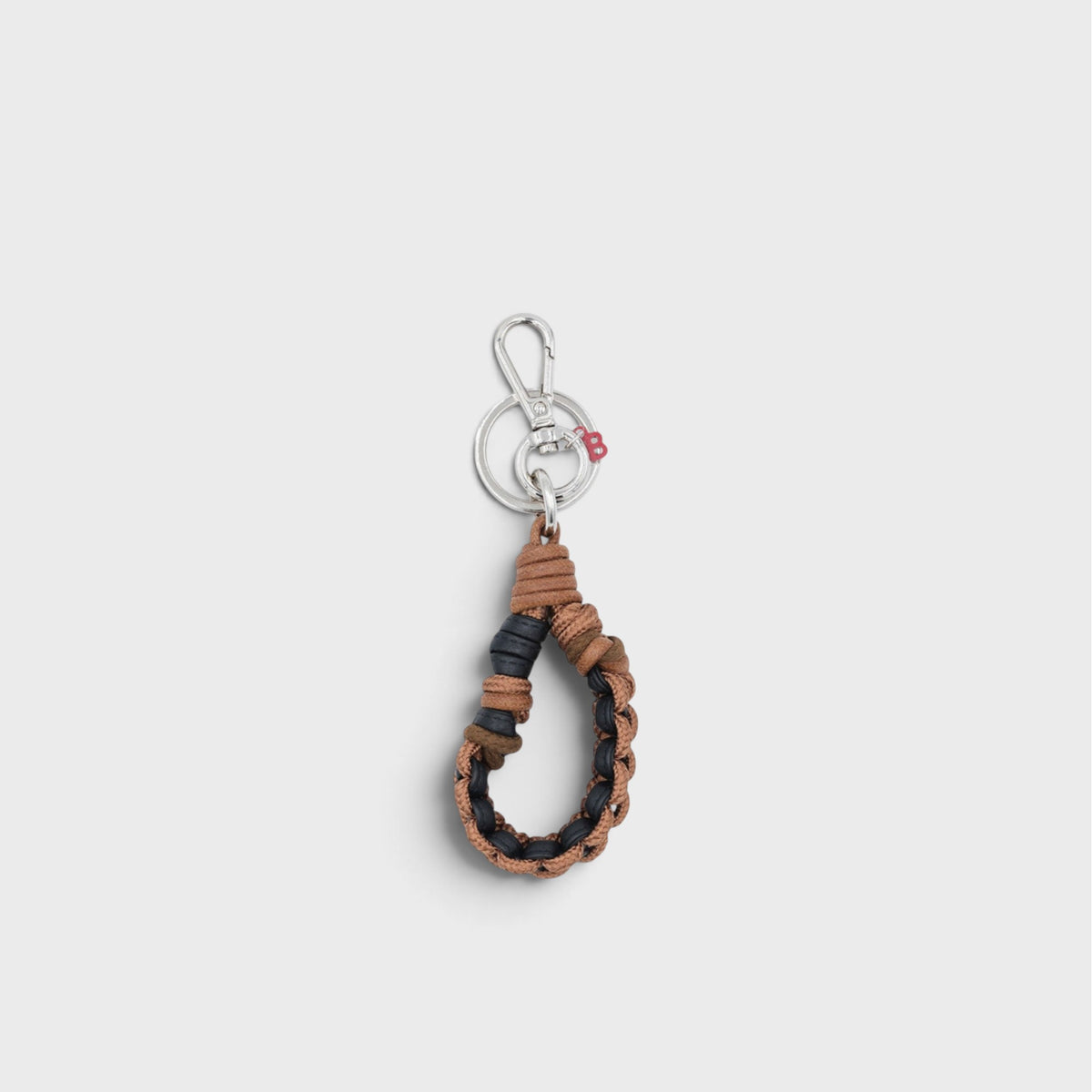 A braided macramé keychain or bag clip in brown and black, featuring a silver metal clasp.