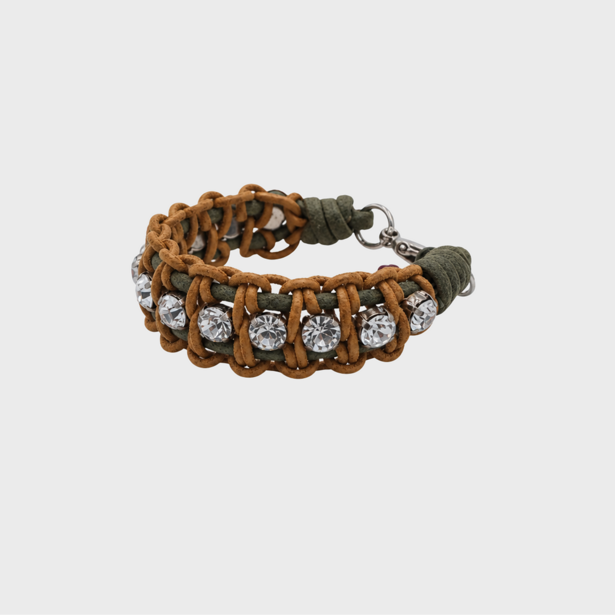 A braided macramé bracelet featuring brown and green cords with small clear beads.