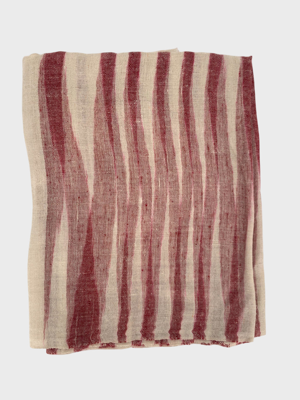 Striped shawl with red and beige pattern on a white background
