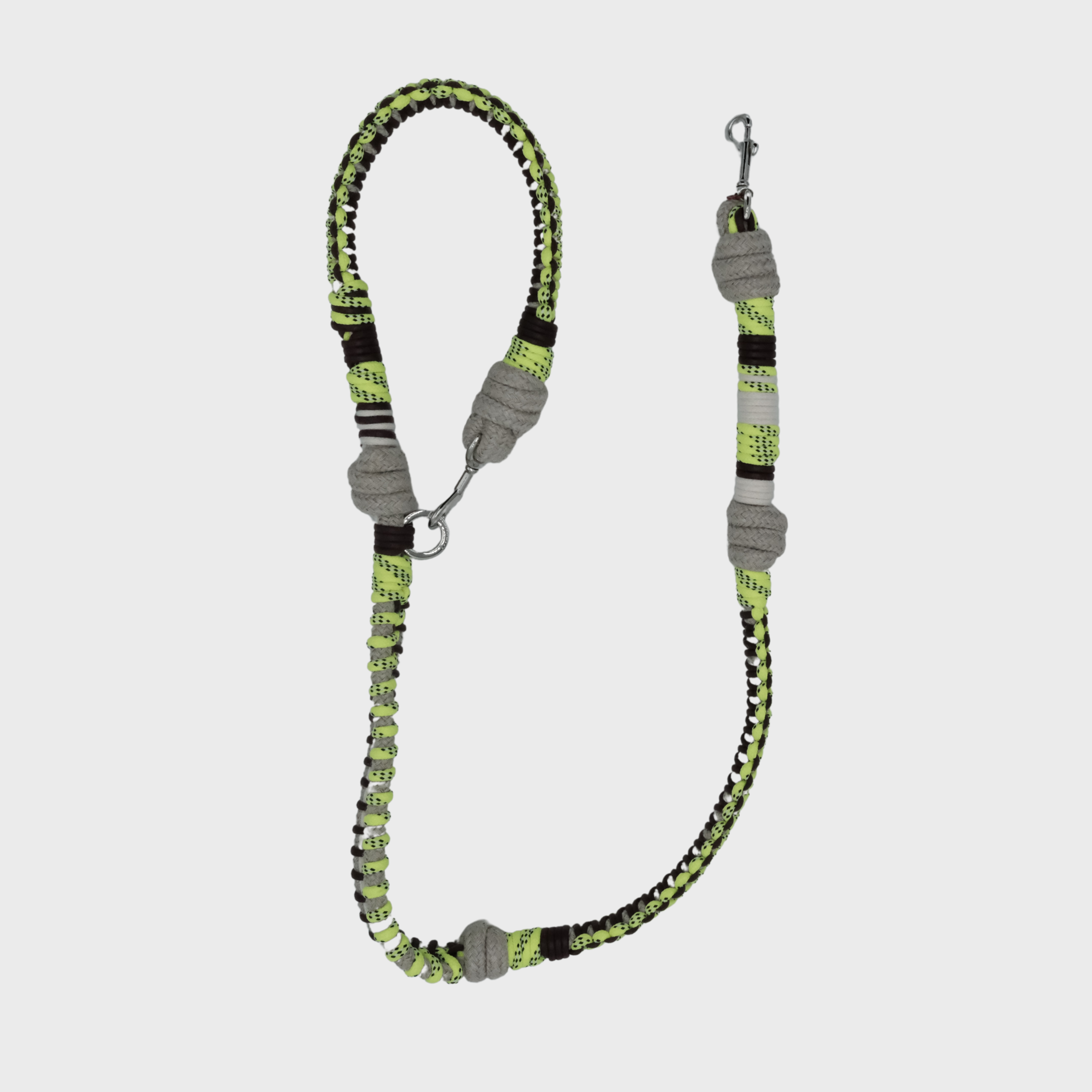 A braided macramé dog leash with neon yellow and beige woven sections, and a silver metal hardware
