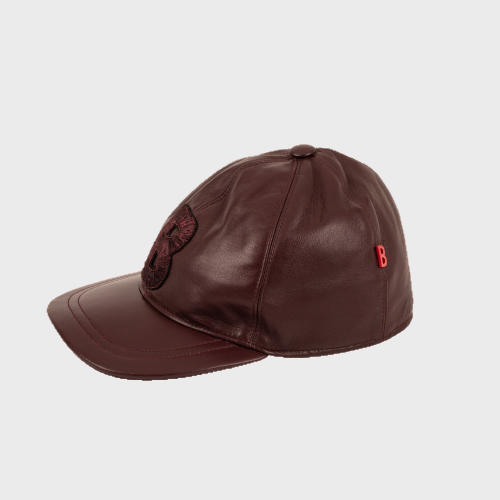 Brown leather cap with a B logo on a light gray background