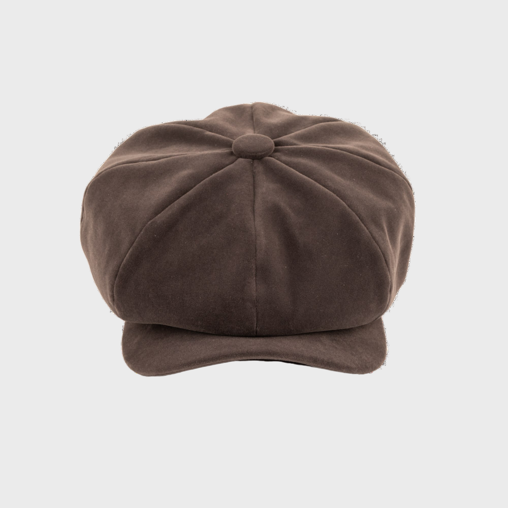Brown grey newsboy cap on a light gray background