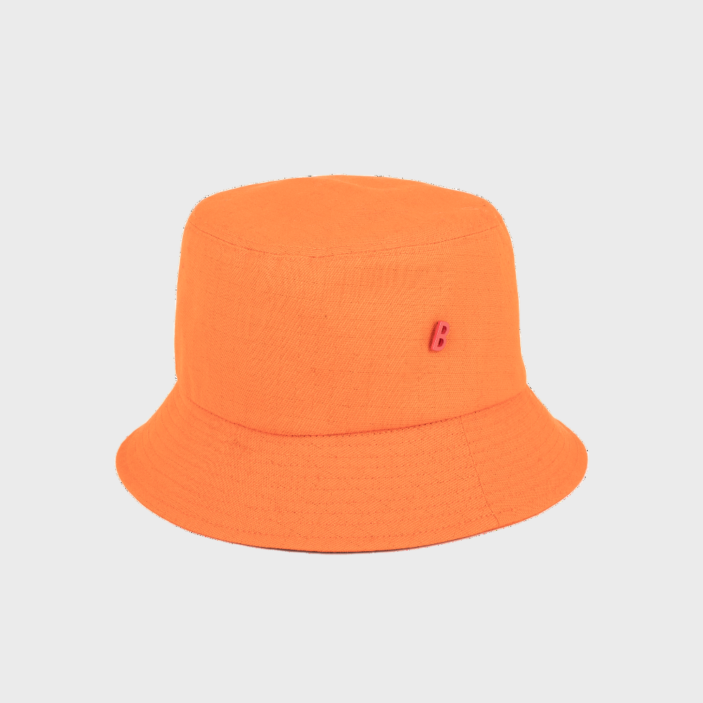 Orange cotton bucket hat on a light gray background