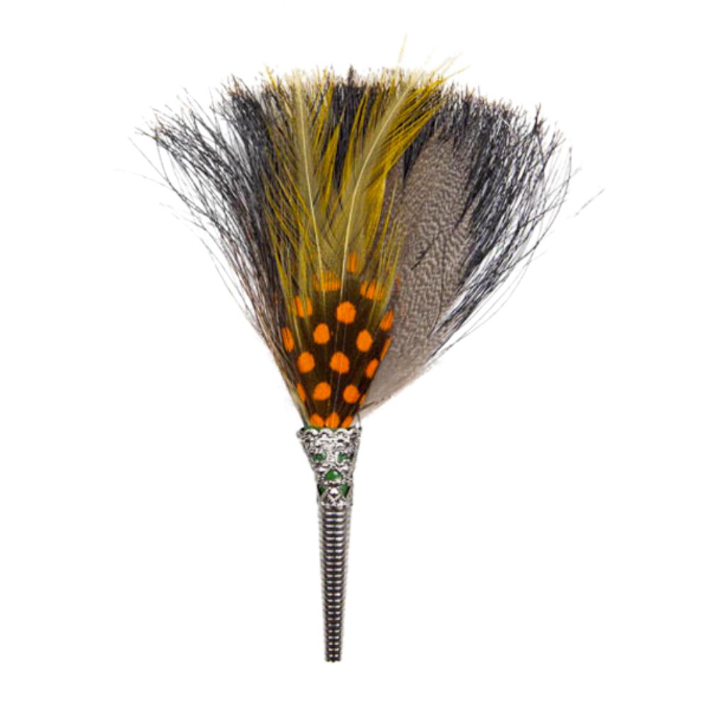A feather brooch with a combination of black, yellow, red, and orange colors, mounted on a metallic pin.