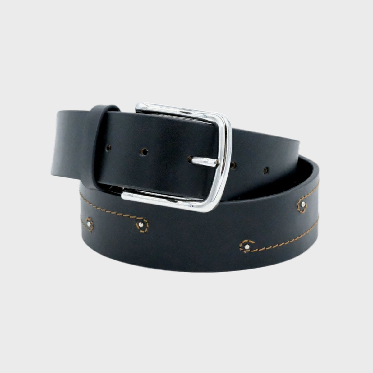 Black leather belt with stitched yellow details with silver buckle on a light gray background