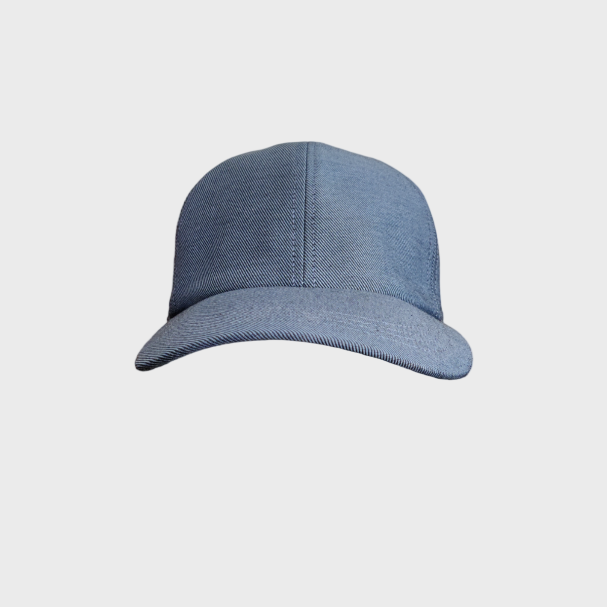 A blue-grey cotton cap facing the camera. 