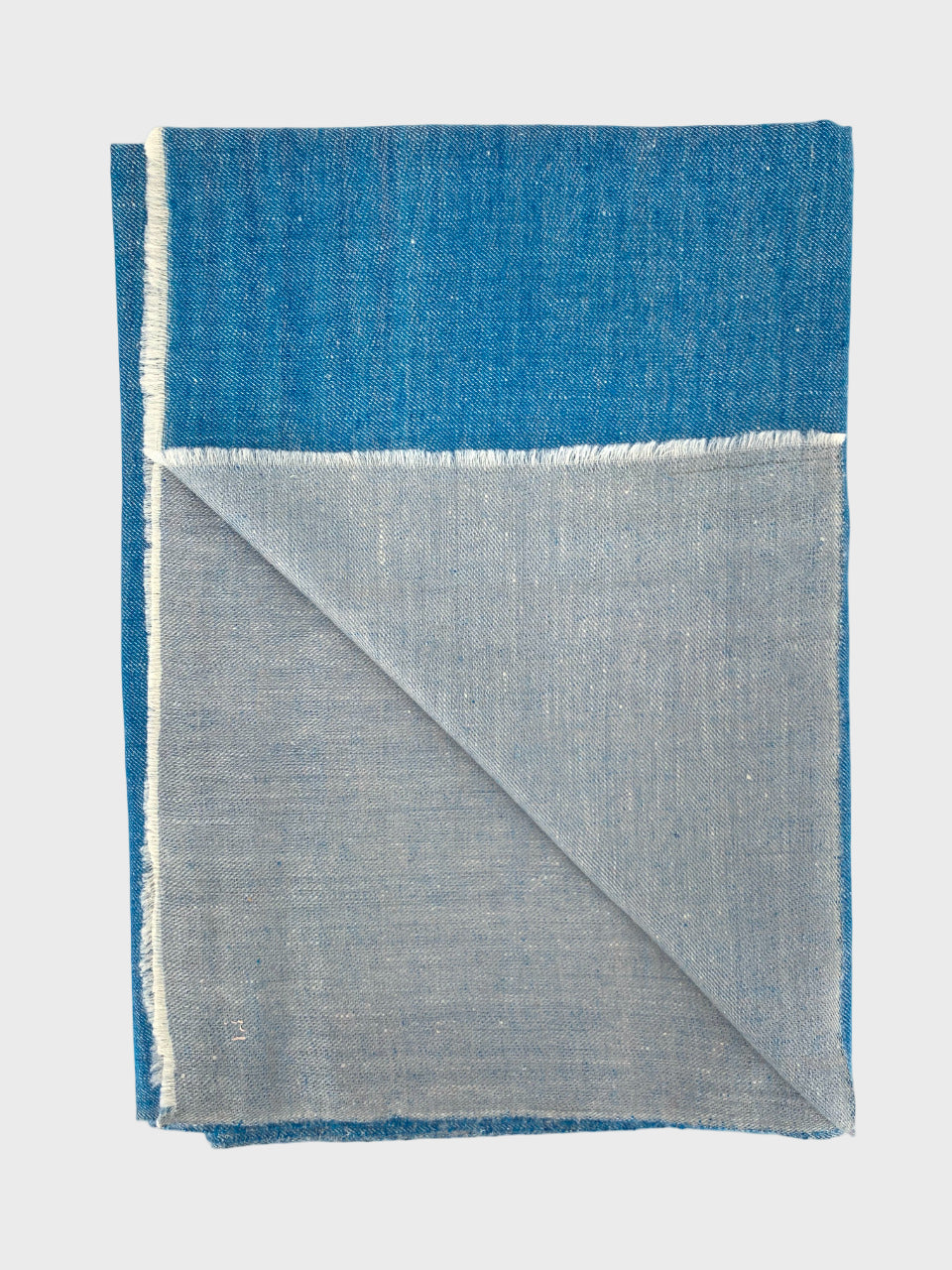 Blue and gray cashmere shawl or scarf on a white background