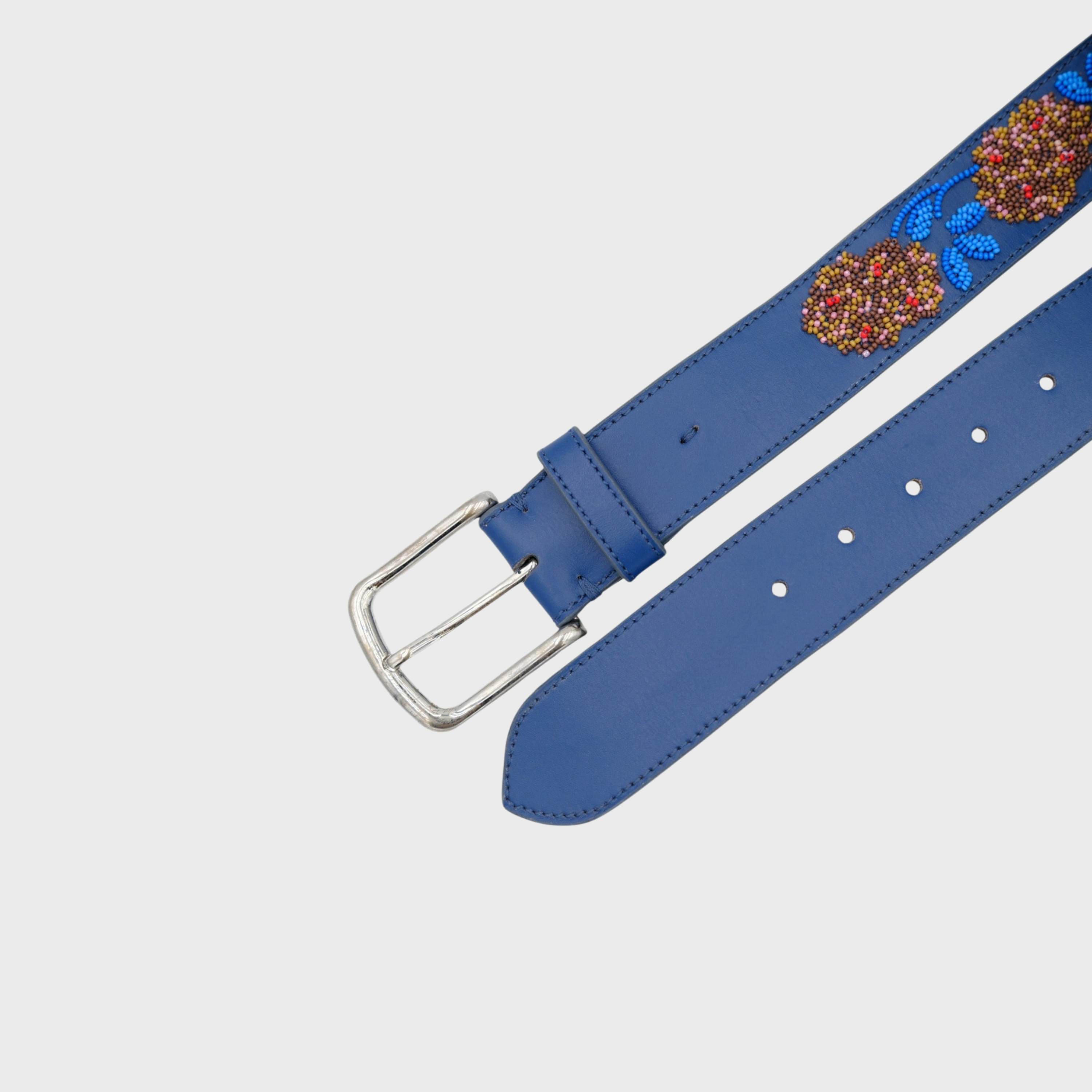 A blue leather belt with a silver buckle, decorated with colorful beaded floral patterns in red, orange, and blue.