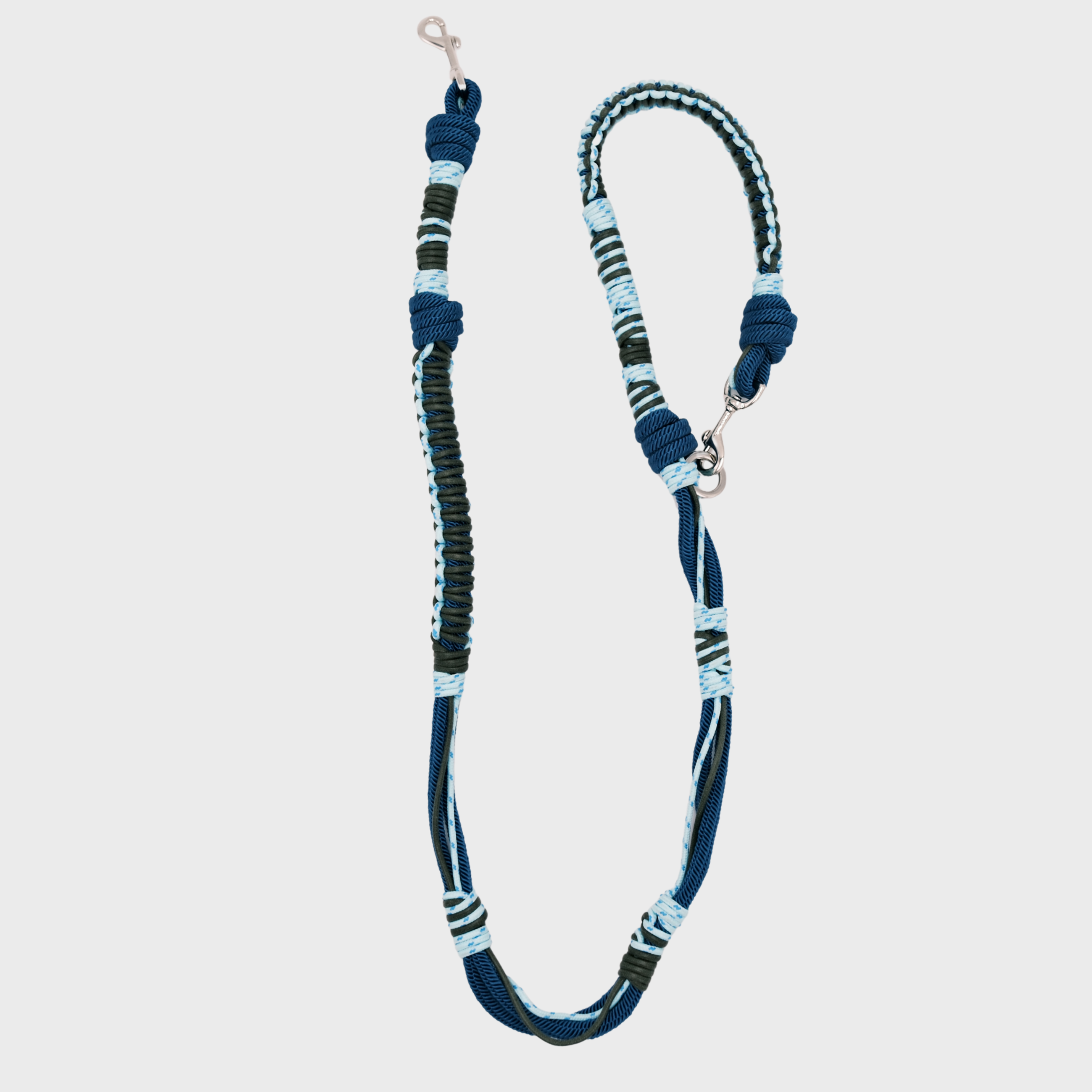 A braided macramé dog leash with light blue and dark blue woven sections, and a silver metal hardware