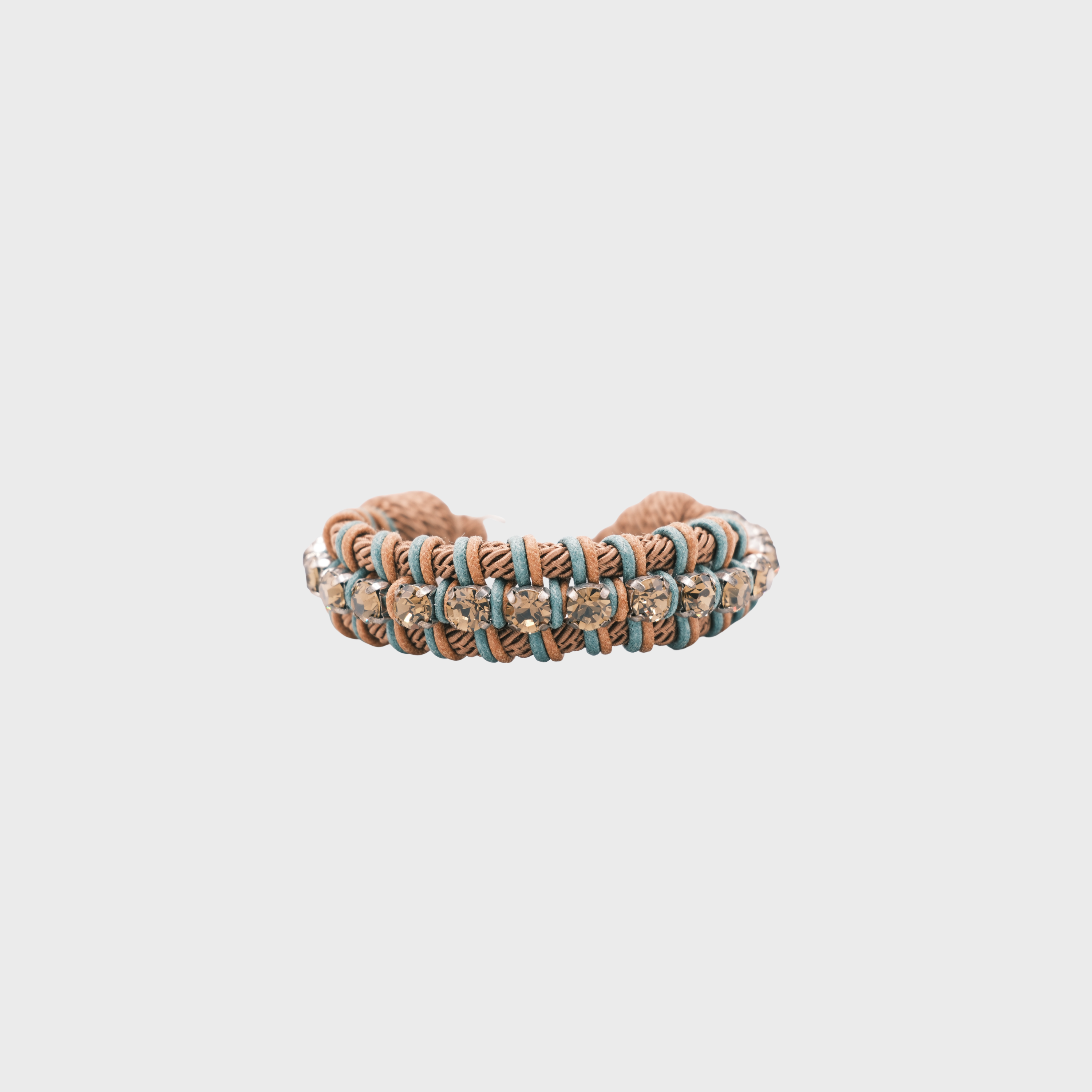 A braided macramé collar featuring brown and green cords with small brown beads.