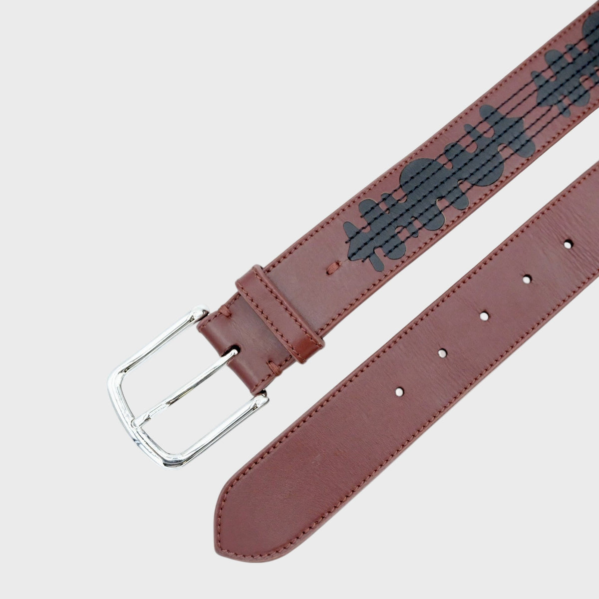 Burgundy Belt with black embroidered pattern shown in diagonal. 