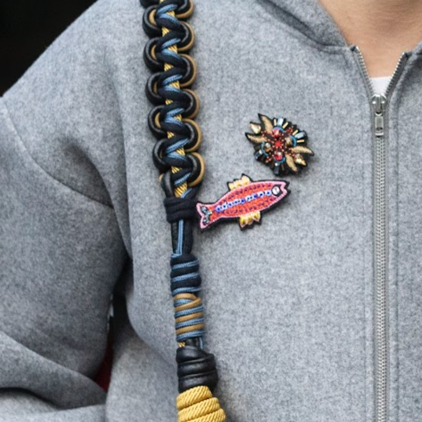 A model wearing the celtic horn brooch. 