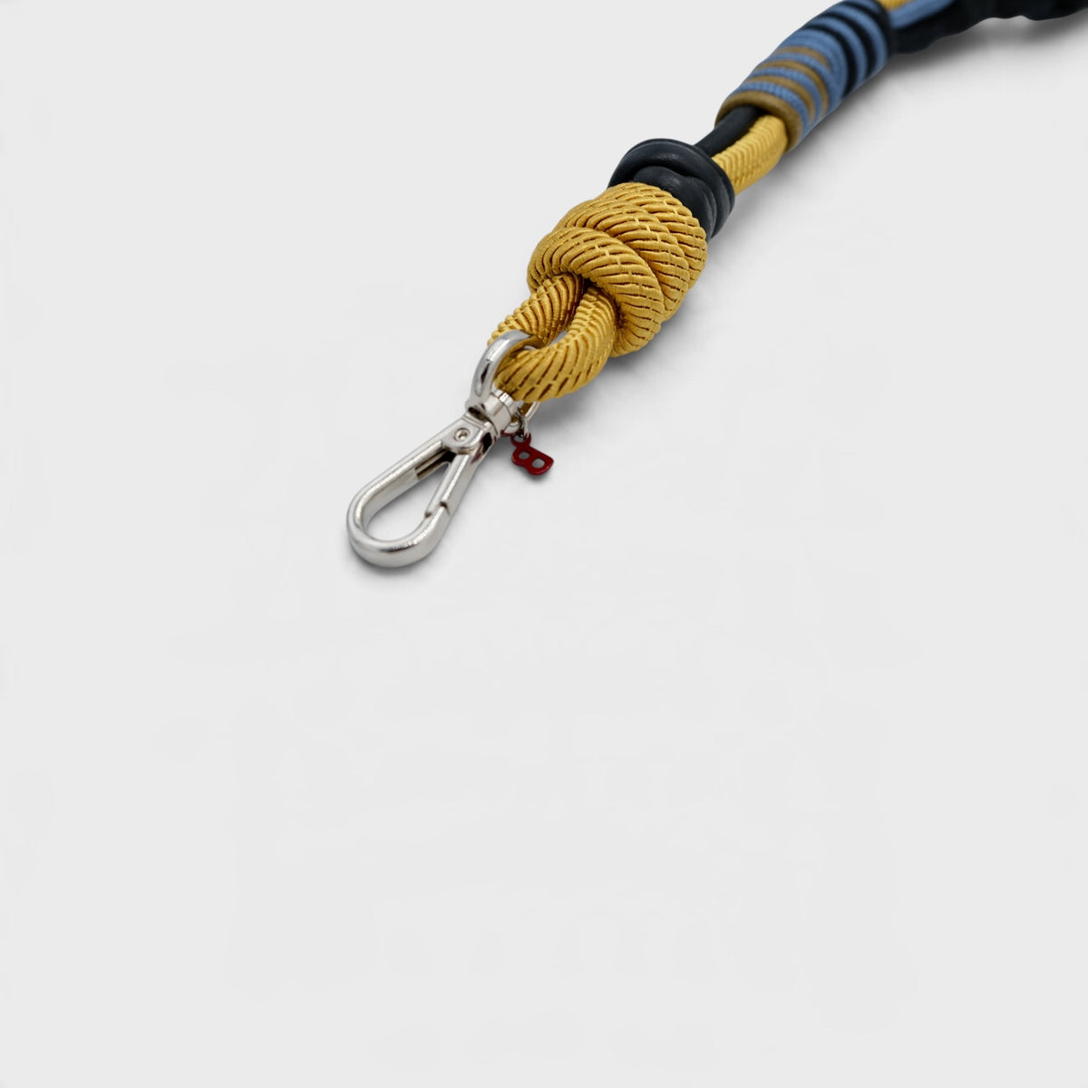 The detail of the macramé braided bag strap.