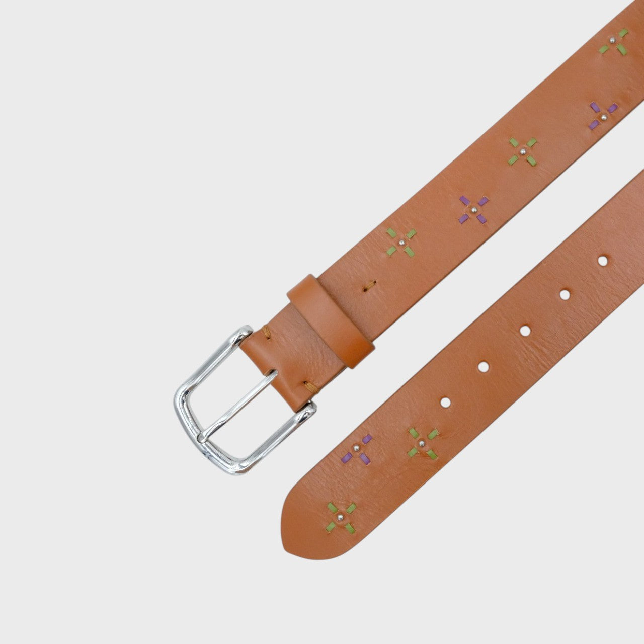 Brown leather belt with floral embroidery and silver buckle.