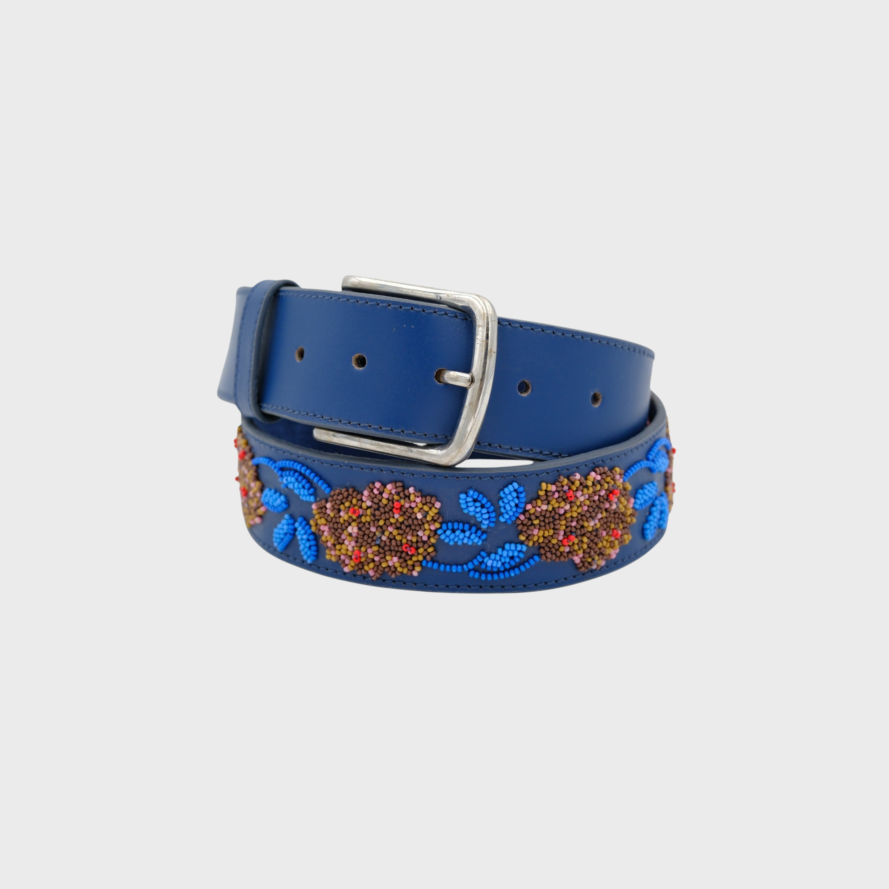 A blue leather belt with a silver buckle, decorated with colorful beaded floral patterns in red, orange, and blue.