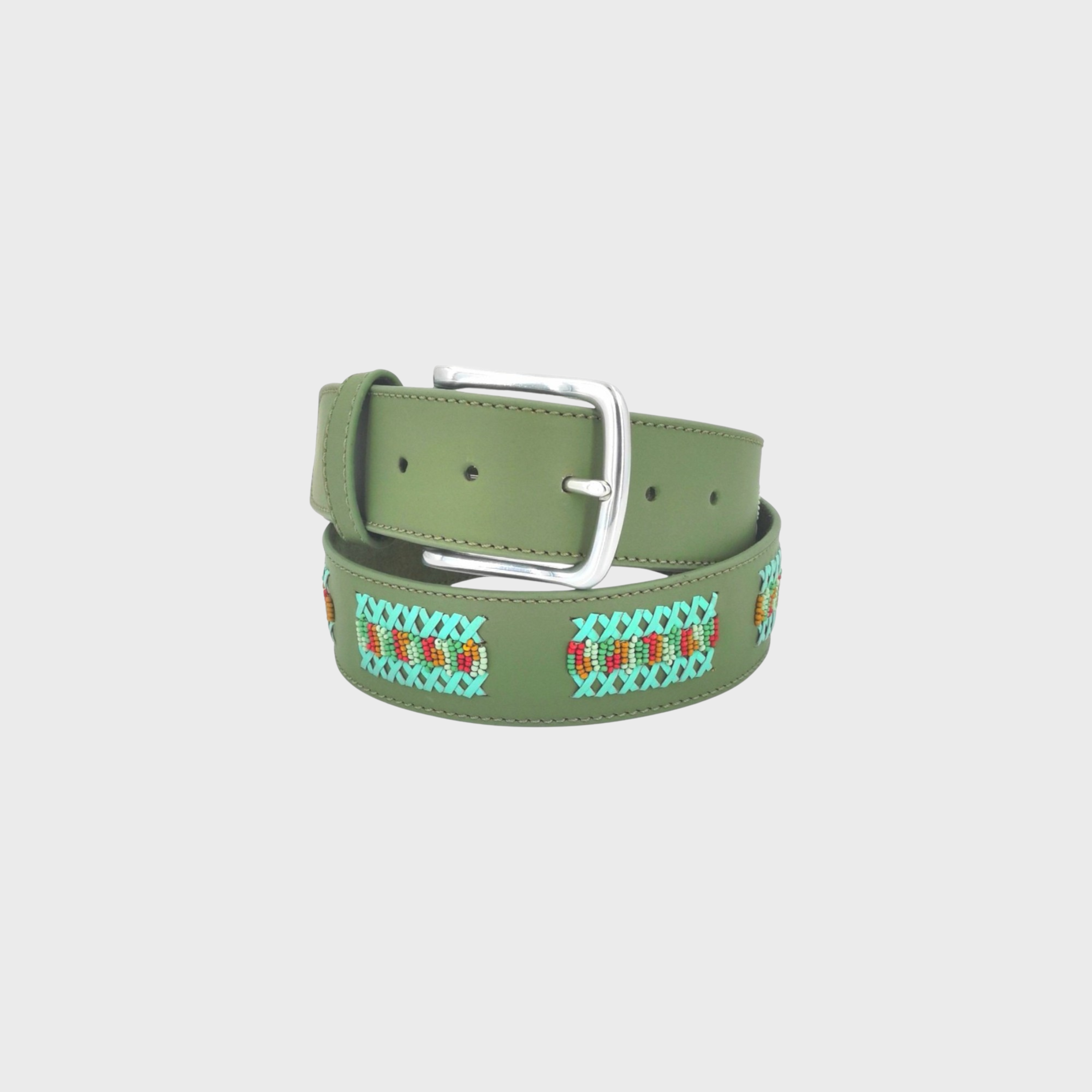 An olive green leather belt with a silver buckle, featuring turquoise, red, and white geometric embroidered patterns along the strap.