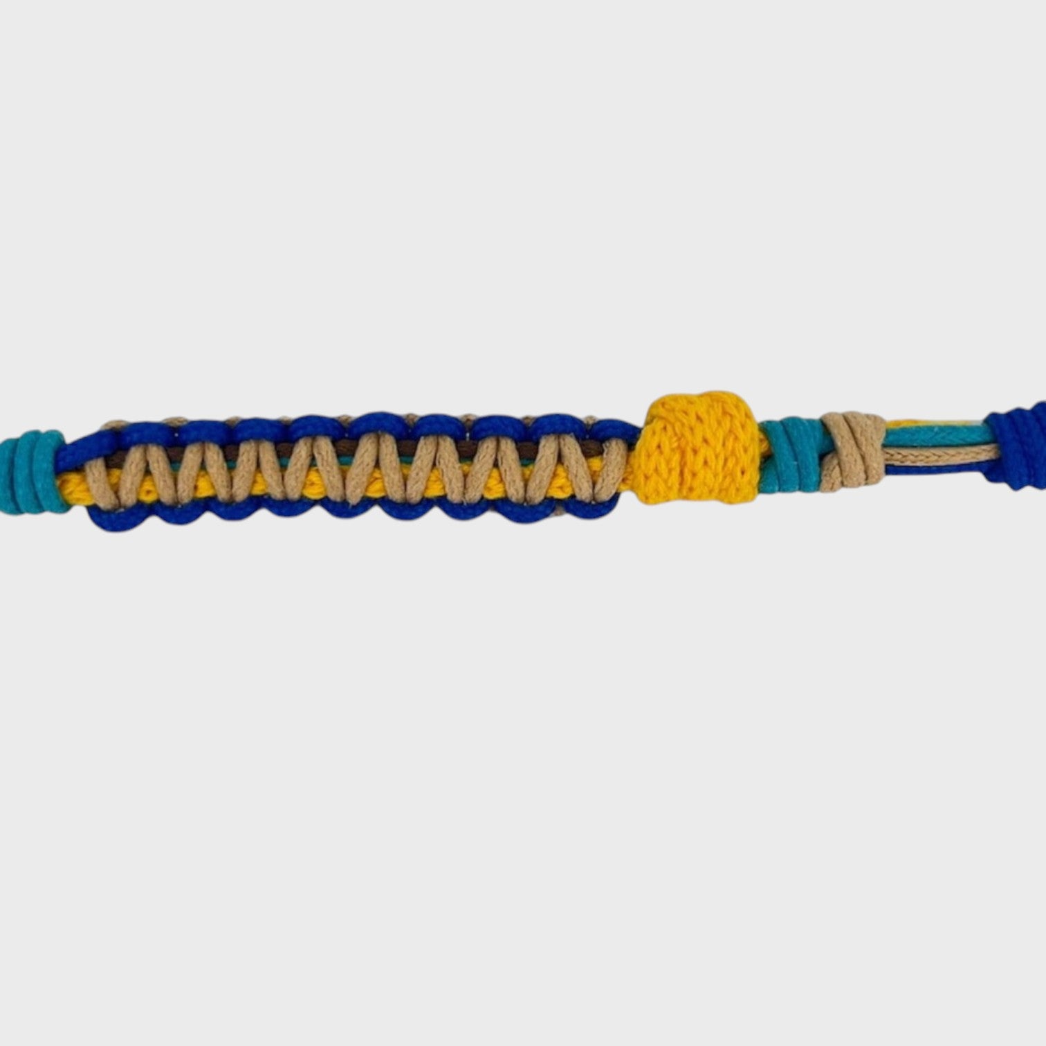 Eyeglasses holder with yellow, blue, brown, green and beige woven pattern on a white background