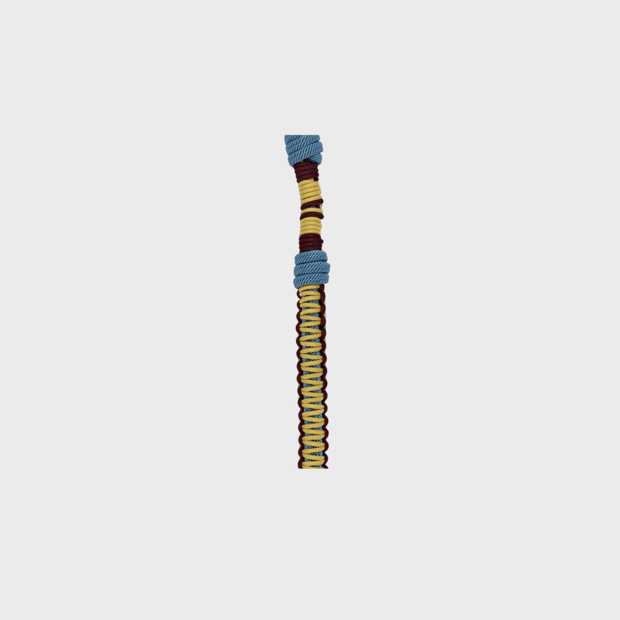 Detail of the yellow, blue and burgundy Tarzan Dog Leash