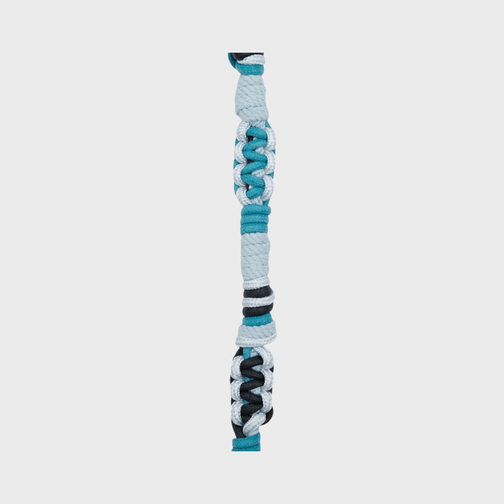 A braided macramé cord collar in shades of blue, dark blue and white with a silver clasp.