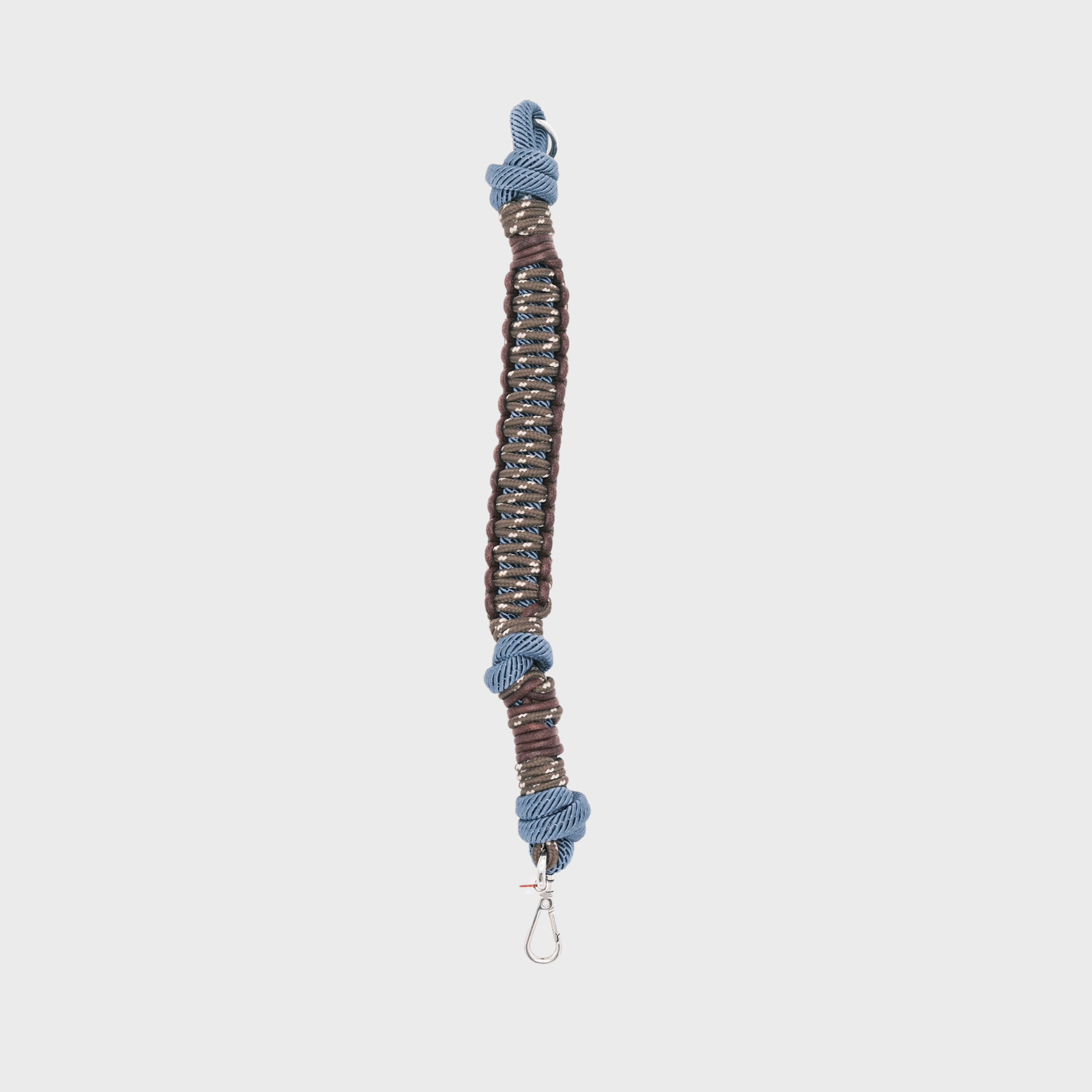 A brown and blue braided dog collar with light blue knotted accents and a metal clip. 
