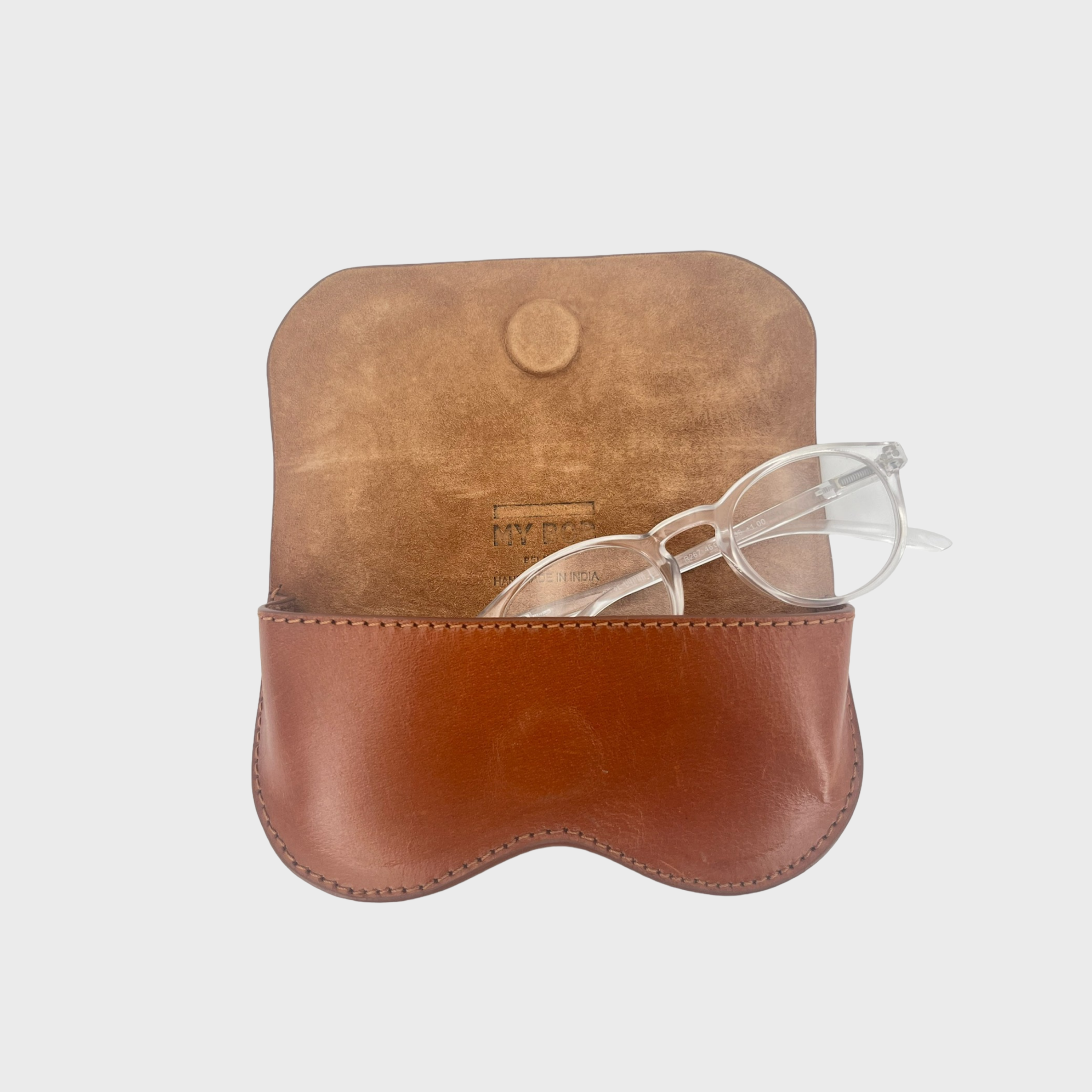 A brown leather glasses case with a snap-button closure, shown on a light gray background.