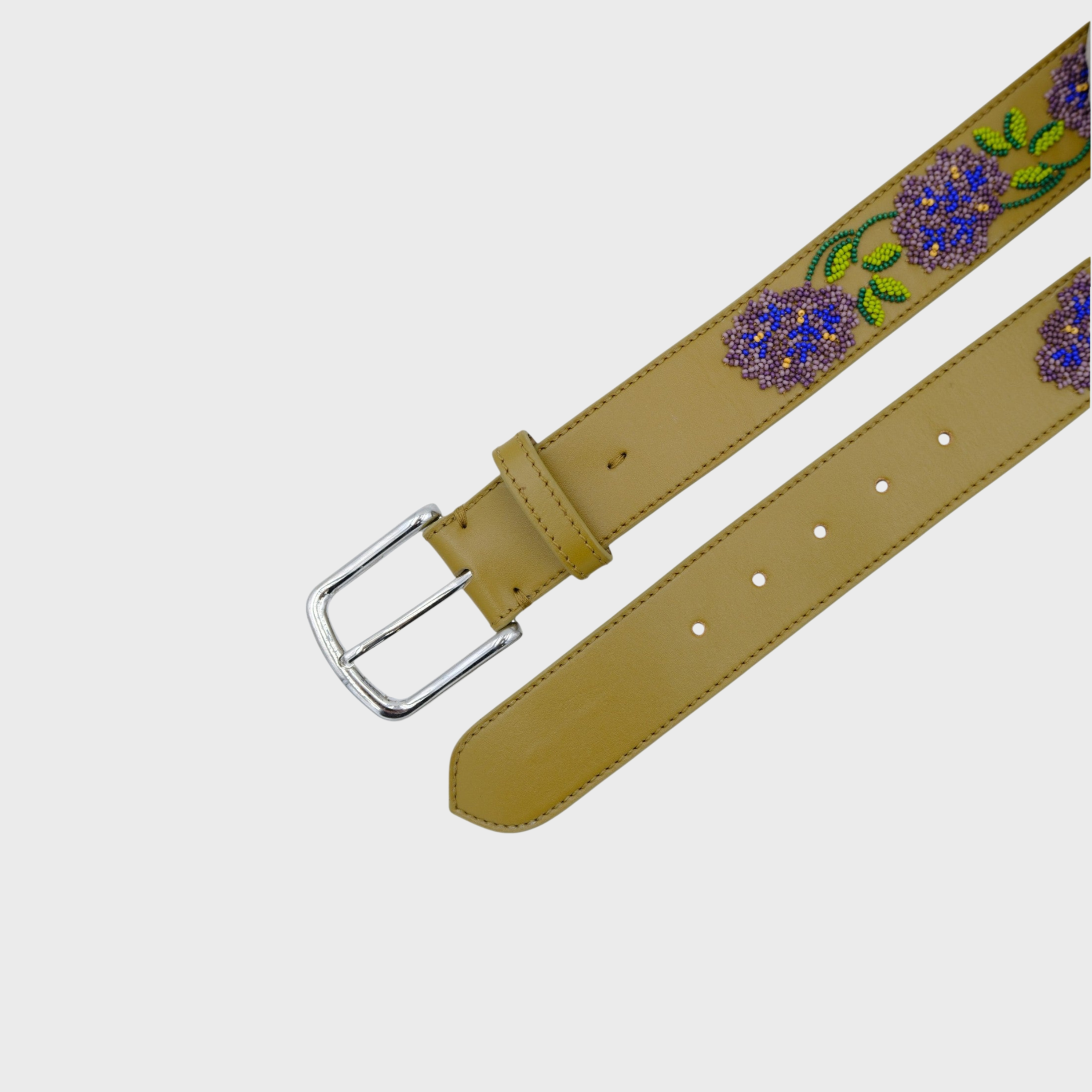 A green leather belt with a silver buckle, decorated with purple and blue floral beadwork and green leaf patterns
