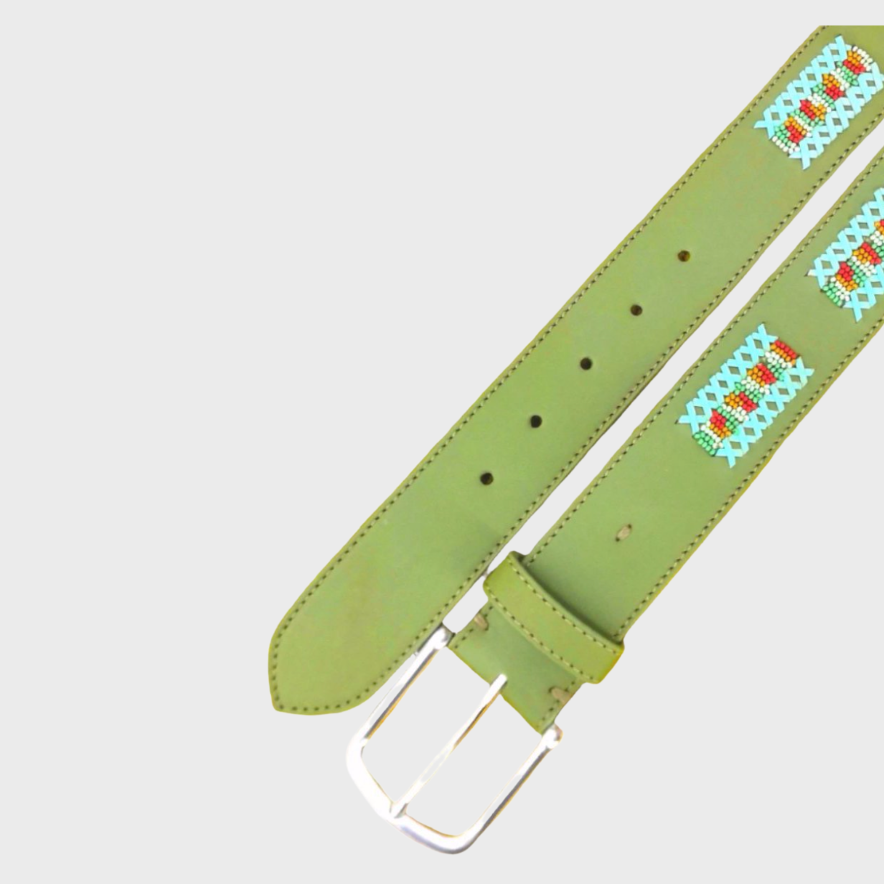 An olive green leather belt with a silver buckle, featuring turquoise, red, and white geometric embroidered patterns along the strap.