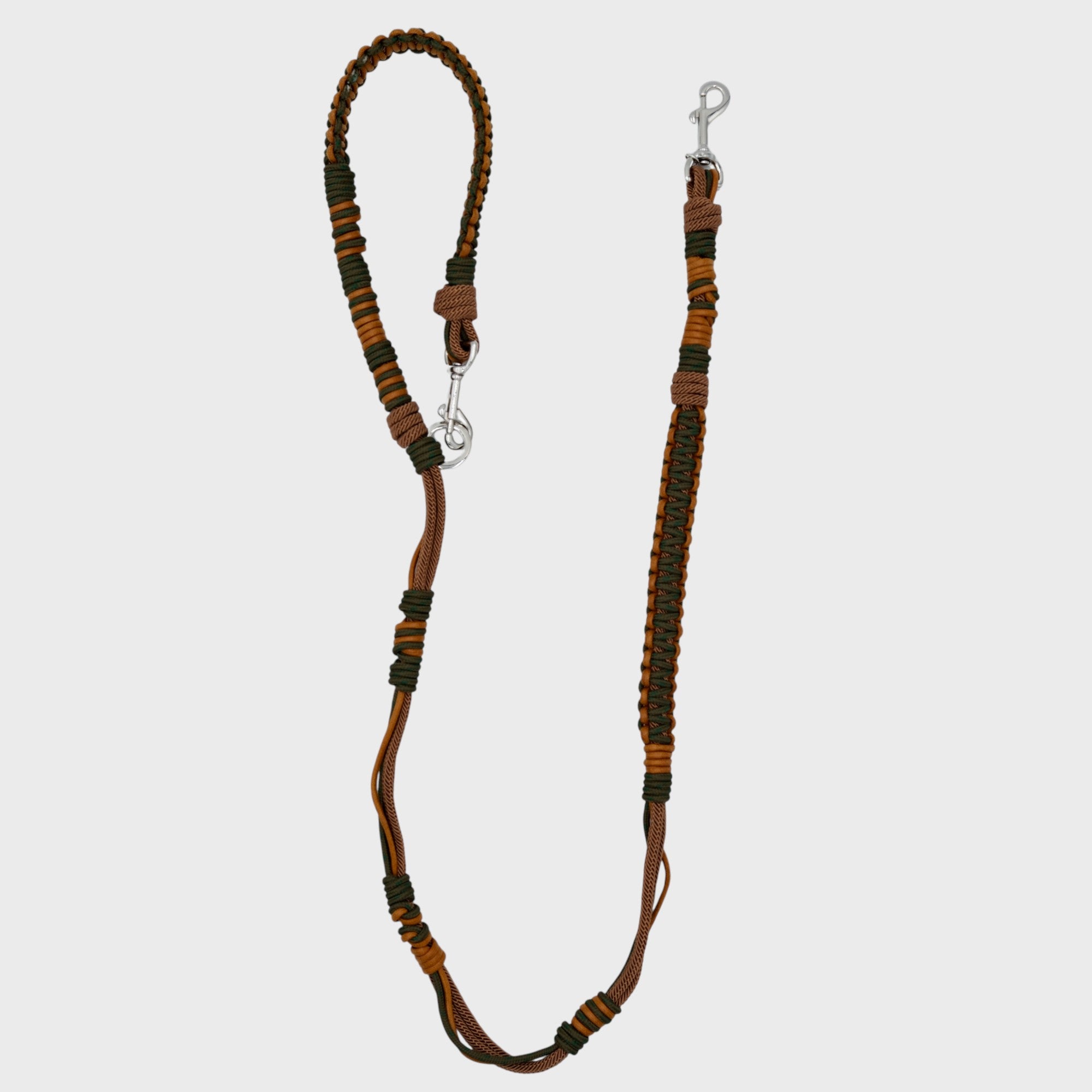 A braided macramé dog leash with dark green, brown and dark yellow woven sections, and a silver metal hardware