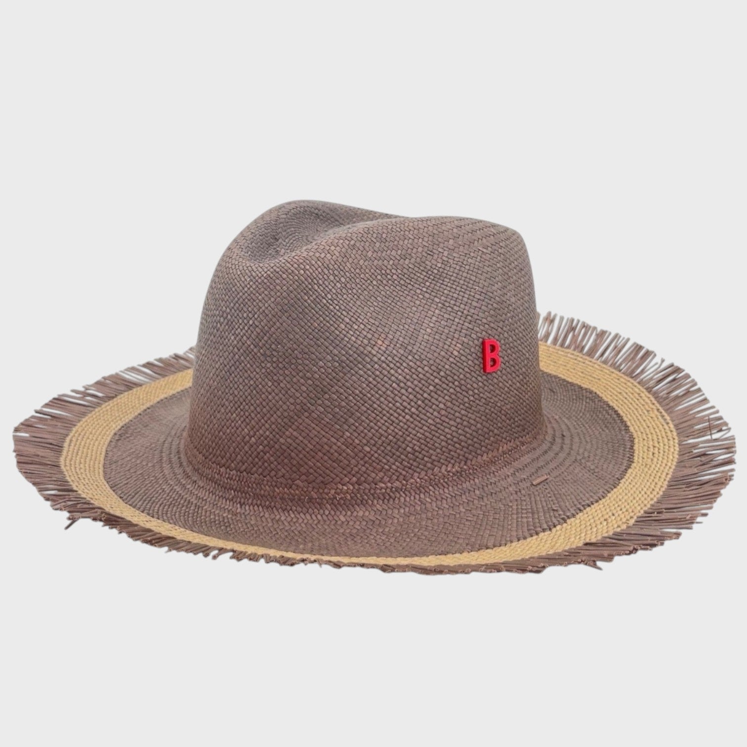 A grey and beige panama straw hat. 
