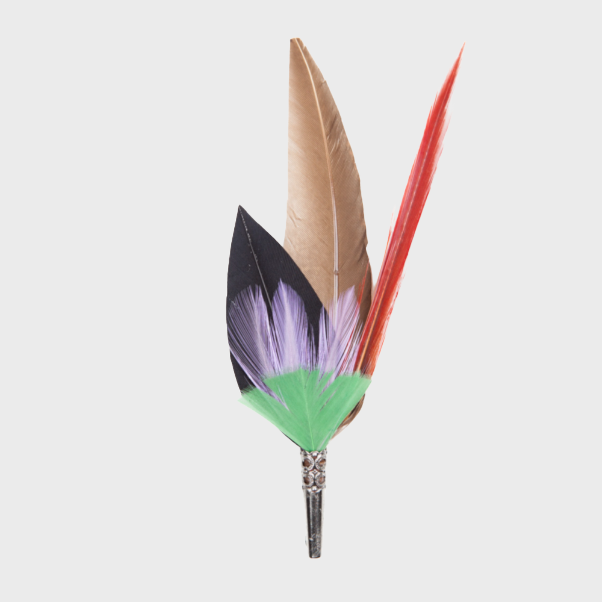 A feather brooch with green, purple, red, beige and black feathers. 