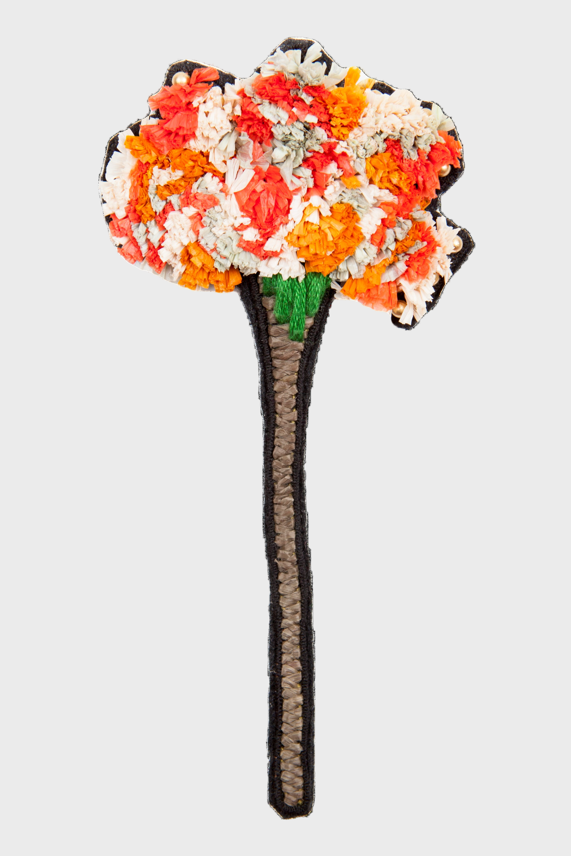 An orange embroidered brooch representing a carnation flower. 
