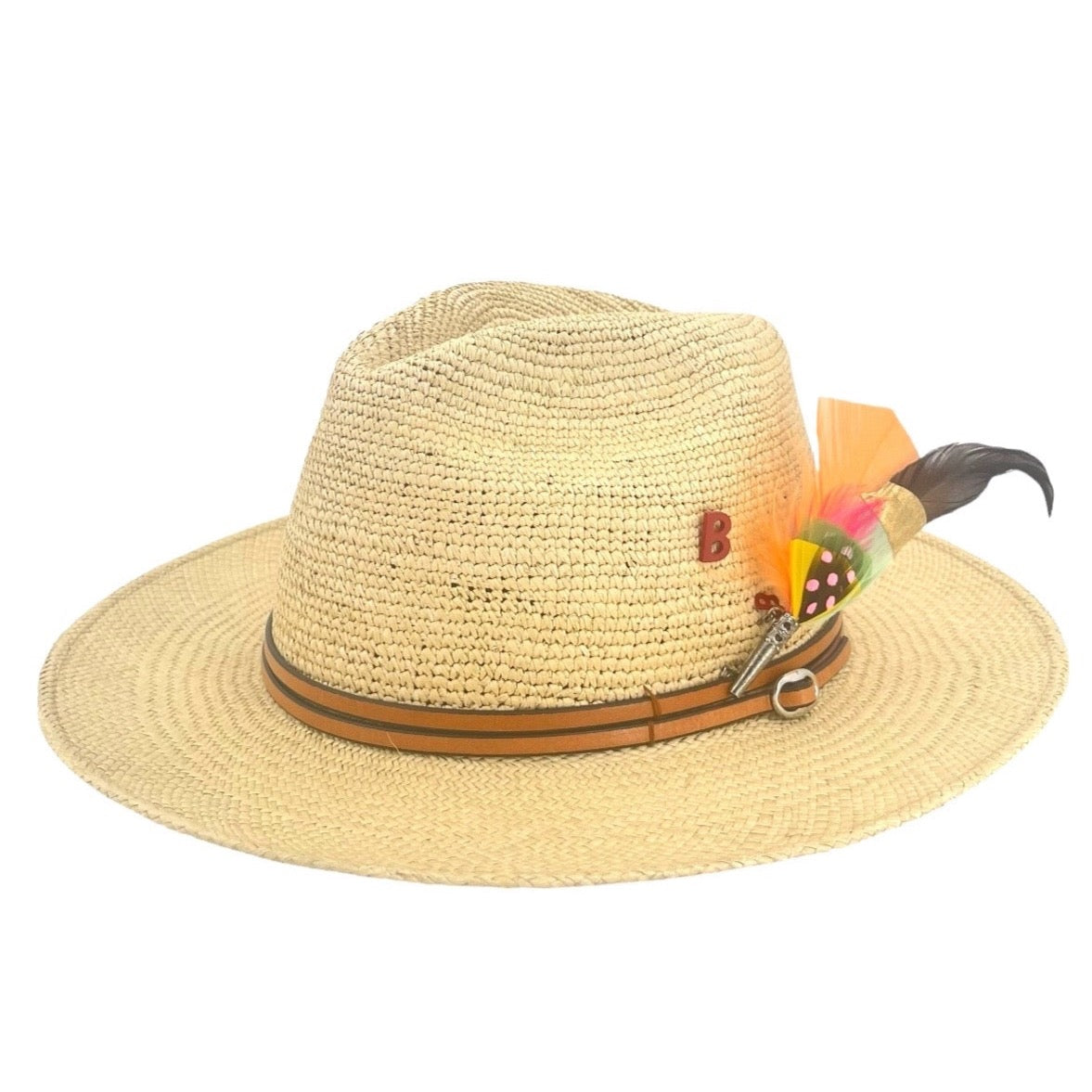A straw hat with a leather band and a colorful feather attached to the brim, handmade in Ecuador.