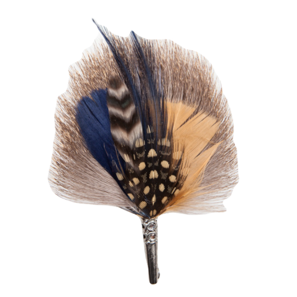 A brooch made of blue, beige and grey feathers. 