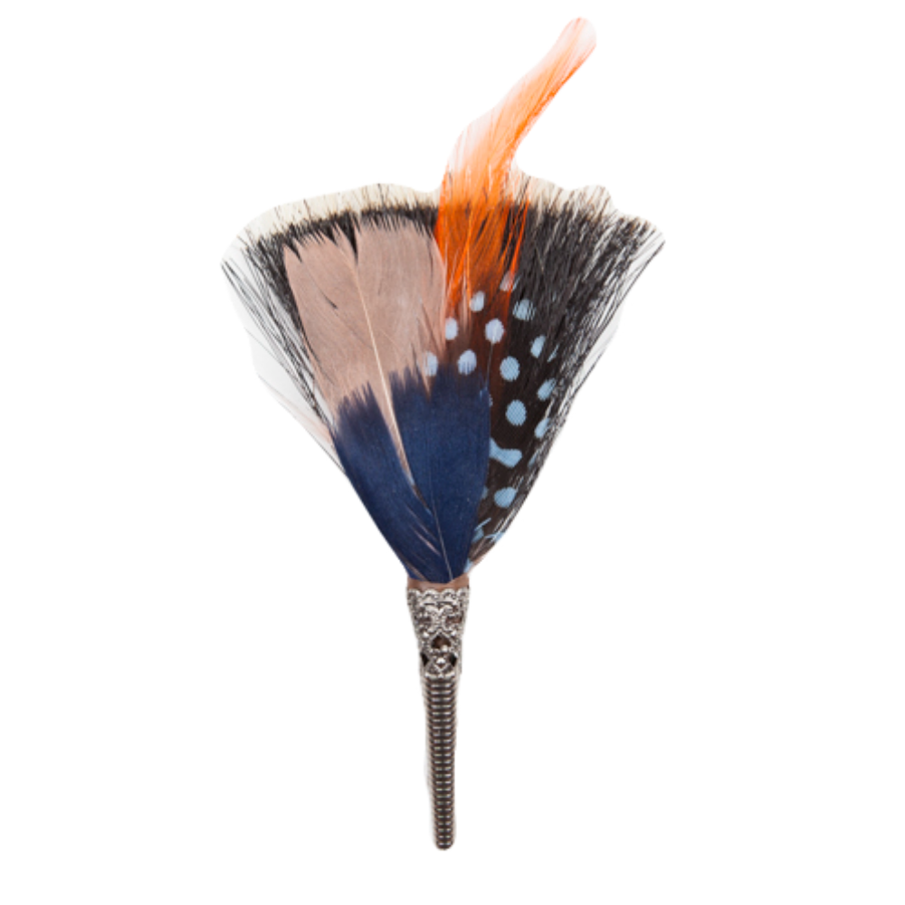 A feather brooch with a combination of blue, black, and orange colors, featuring a central quill design and farm feathers around it.