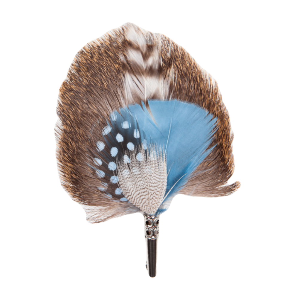 A feather brooch made of blue and grey feathers. 