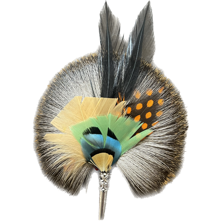 A round brooch featuring a collection of dyed feathers in various colors and patterns, attached to a central point with a metallic-looking hardware.