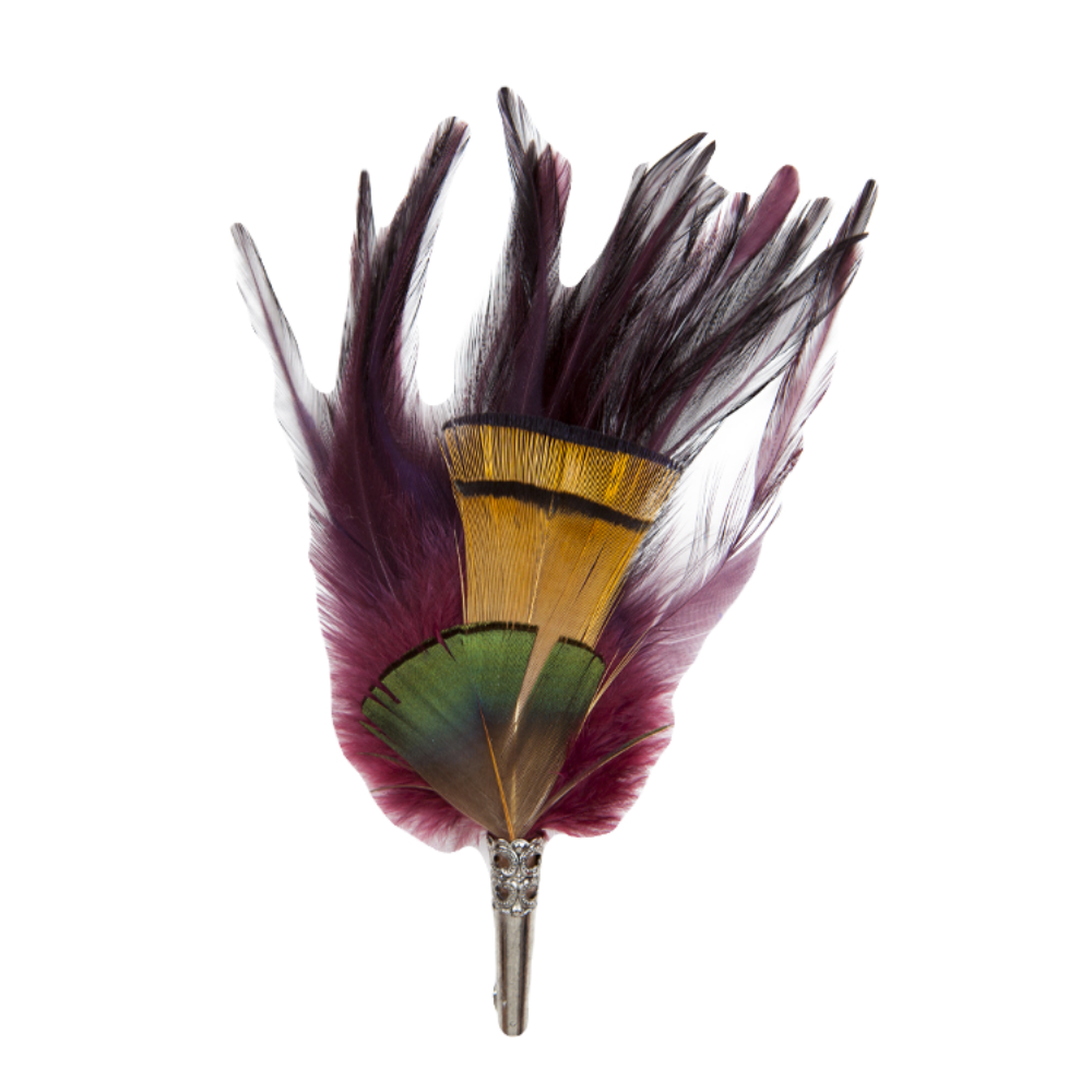 A feather brooch with purple, yellow and green feathers. 